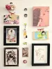 Em Nishizuka Ema Wish Plaque - hanging on the wall with other AkaTako items