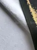 Em Nishizuka Muffler Scarf - blank reverse side of scarf